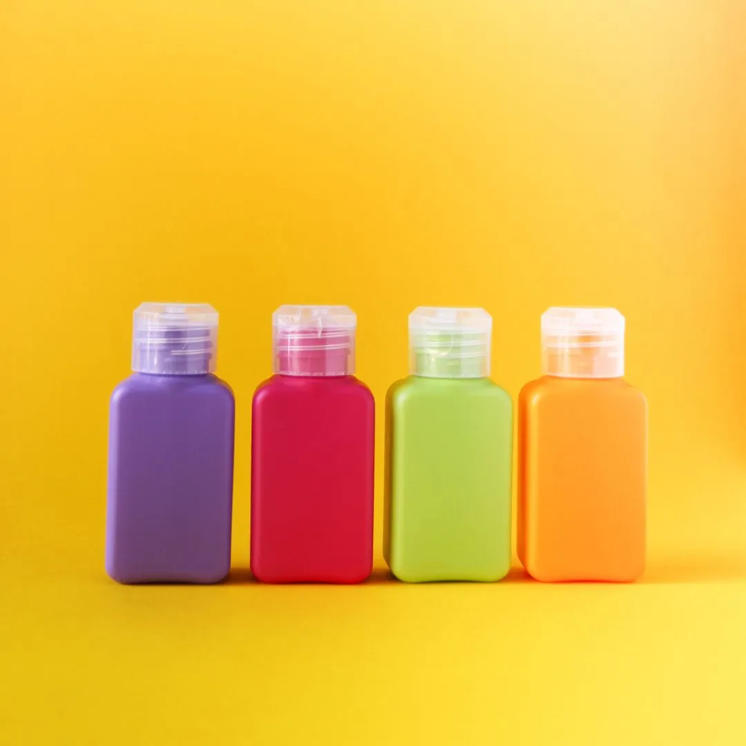 unbranded coloured bottles waiting to be branded